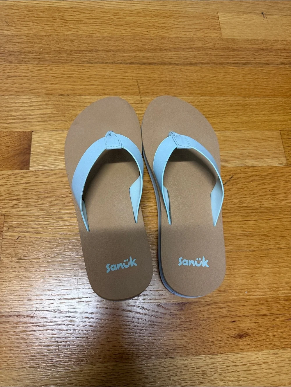 Sanuk Women’s Tan Footbed Flip Flops with Light Blue Straps